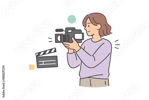 Female filmmaker with camera and clapperboard: young caucasian adult creating film