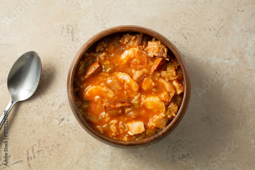 A top down view of a bowl of jambalaya.