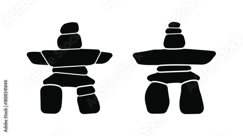 Two stacked stone figures presented as a dark silhouette