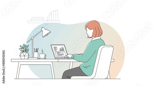 Woman Working on Laptop at Desk.