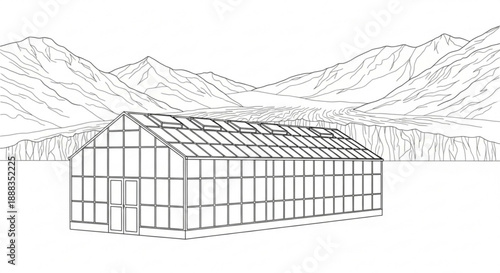 Greenhouse structure with transparent walls and roof in front of mountains