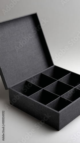 Wallpaper Mural Black Storage Box With Compartments On Neutral Background Torontodigital.ca