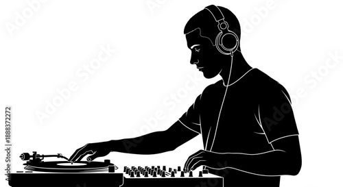 A person wearing headphones operates a DJ mixer with skillful hands indoors.