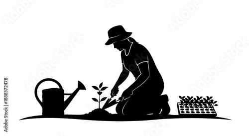 Man planting a small seedling in the ground with a watering can nearby, kneeling on one knee