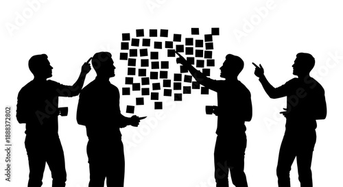 Silhouetted figures assembling puzzle pieces together in a collaborative effort