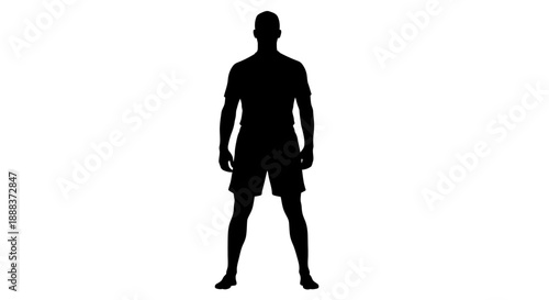 Silhouette of a man standing confidently with feet apart in athletic attire