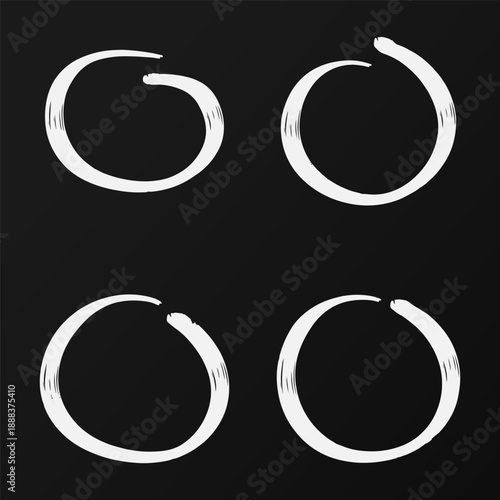 White brush stroke circles on black background zen enso elements