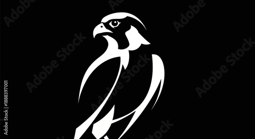 Bold silhouette of a bird of prey on black background