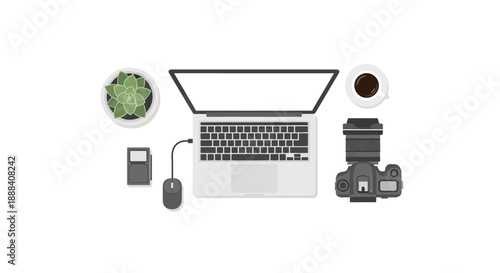 Top View of a Photographers Desk with Laptop and Camera.