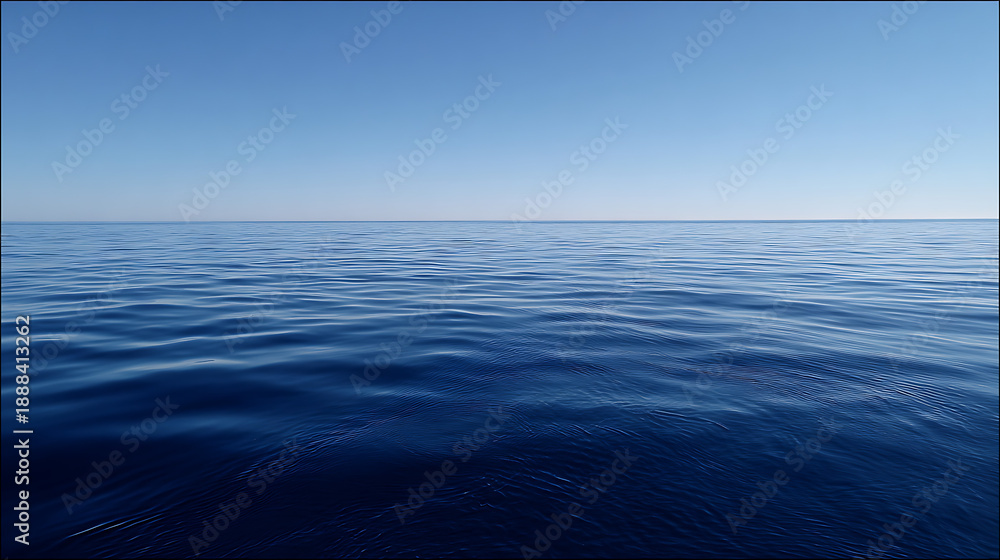 Fototapeta premium Deep Blue Ocean Water Under Clear Blue Sky Horizon
