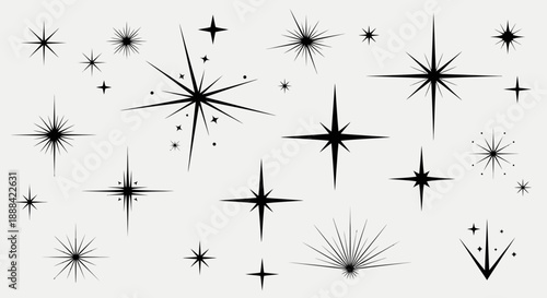 Collection of Sparkling Starbursts and Twinkling Embellishments on a Plain Background
