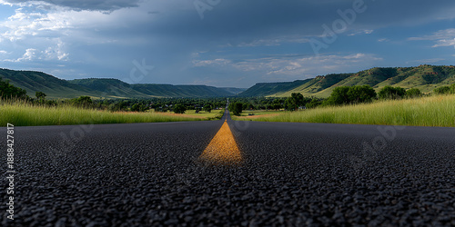 3D rendering of low angle empty asphalt road leading through green valley