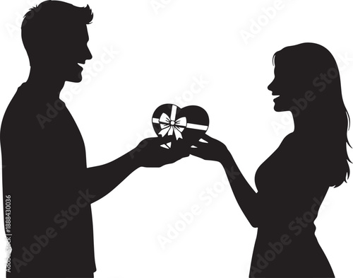 Man giving heart shaped gift box to woman romantic gesture