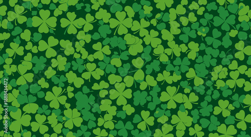 A dense pattern of green shamrocks and four-leaf clovers on a dark green background, symbolizing luck and St. Patrick's Day.