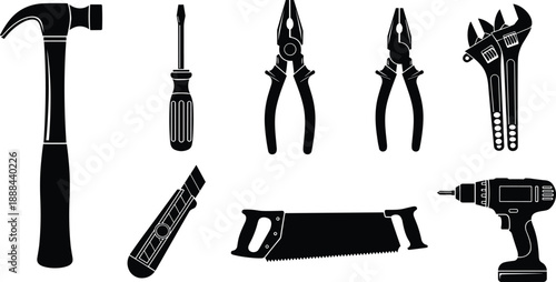 Collection of black silhouette icons featuring common hand tools including hammer screwdriver pliers wrench hand saw and cordless drill isolated on white for construction