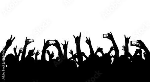 Silhouette of Excited Crowd Cheering at a Concert or Festival Event