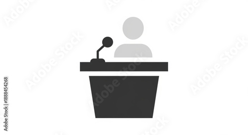 Person speaking at a podium with microphone in a conference setting for business presentation