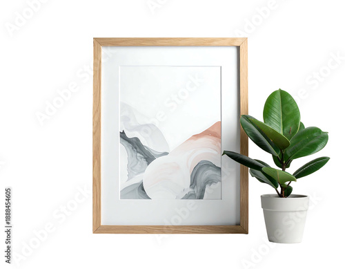 A framed abstract painting sits alongside a potted plant on a black background, with soft colors and textured appearance