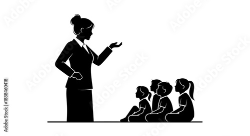 Teacher instructing young students in a classroom setting.