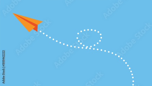 Orange paper airplane flying in a loop