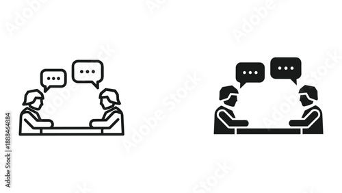 Two people having conversation across table