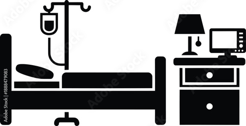 Hospital bed with I V drip and bedside table with lamp and monitor