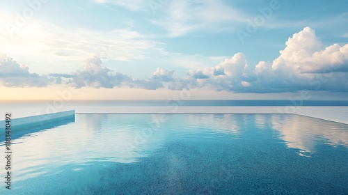Tranquil infinity pool overlooking ocean under cloudy sky and sunlight