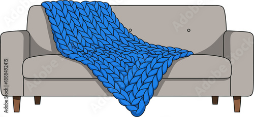 Cozy Beige Sofa with Bright Blue Chunky Knit Throw Blanket Illustration