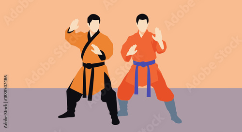 Two martial artists practicing karate stances together in uniform.