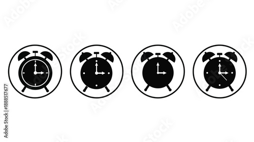 Four alarm clocks displaying different times black silhouette