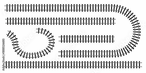 Overhead view of a model railroad track layout with curves and straights