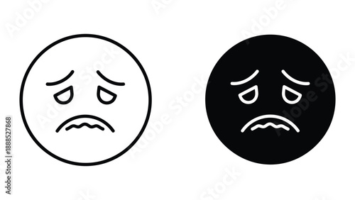 Angry face emoticon in white and black