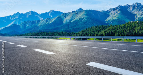 Wallpaper Mural Empty asphalt highway road and green forest with mountain natural landscape in summer Torontodigital.ca