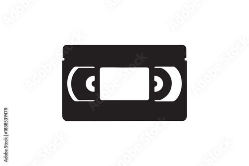 Vintage vhs cassette tape icon in solid black silhouette style isolated on white background retro art