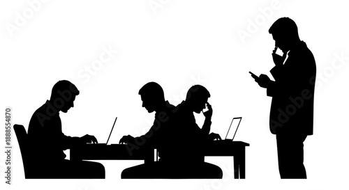 Silhouette of a team working on laptops with a manager observing and using a phone
