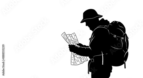 Silhouette of a focused traveler with a backpack navigating with a paper map outdoors