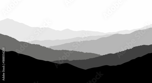 Monochromatic mountain range landscape with layers of hills and valleys in black and white gradient