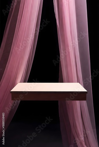 Elegant floating display podium with a minimalist white surface, beautifully framed by soft pink sheer fabric against a dramatic black background, ideal for product presentations