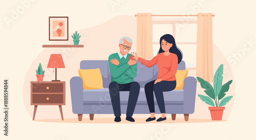 A woman comforts an elderly man experiencing shoulder pain on a couch
