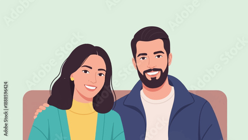 A smiling couple, a man with a beard and woman with dark hair, on a couch