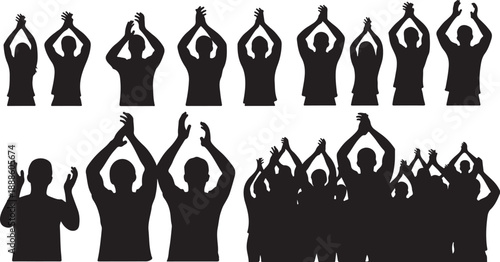 Silhouettes of people with hands raised in celebration together