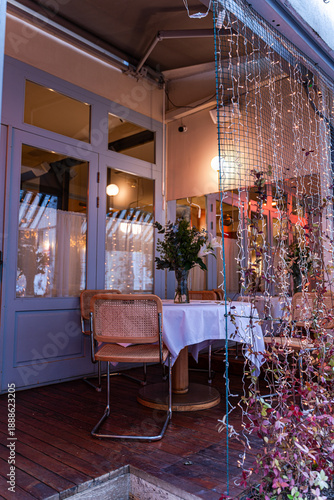 Wallpaper Mural table with lily bouquet on outdoor terrace Torontodigital.ca