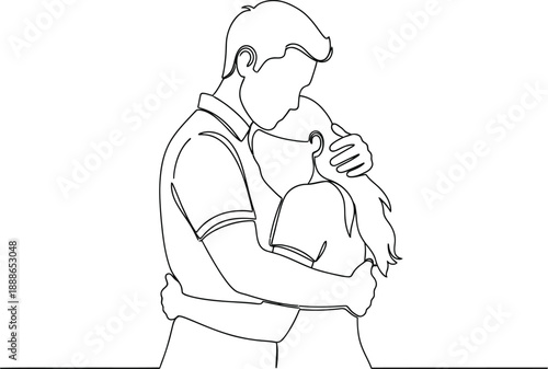 A man tenderly holding a small dog