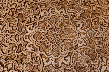 Intricate patterns of Alhambra palace capturing the essence of Spain's history