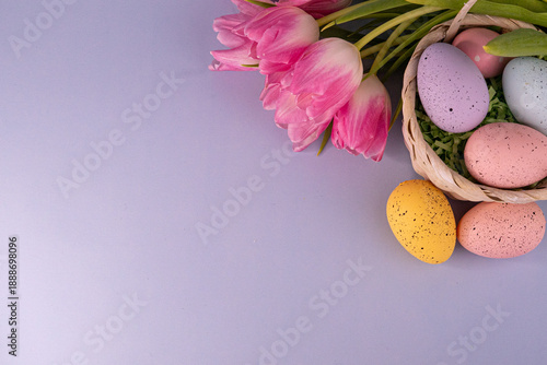 chocolate easter eggs and pink tulips