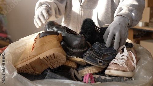 Photography Volunteers sorting donated footwear for community aid