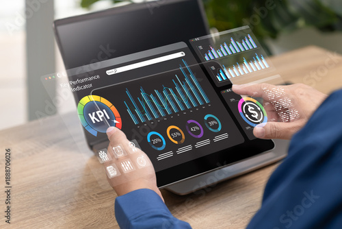 KPI performance measurement concept, Businessman use tablet analyze key performance indicators dashboard, Tracking business progress, Project results, Goal achievement, Digital analytics