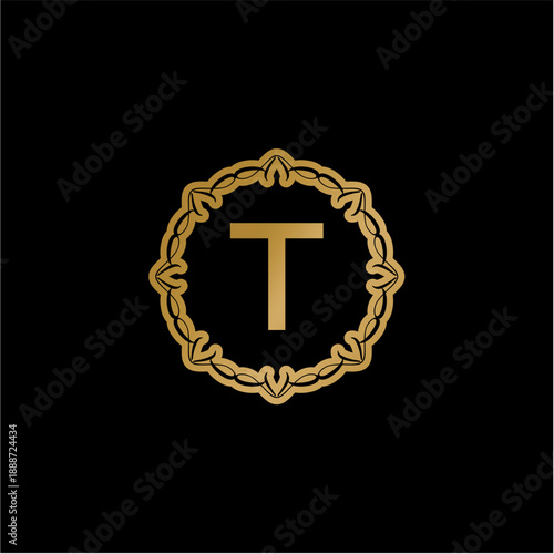 Elegant Golden Letter T Monogram within an Ornate Circular Frame on a Black Background
