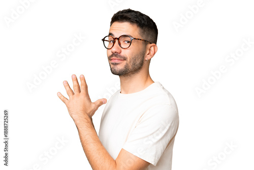 Fotografija Young handsome caucasian man over isolated chroma key background scheming someth