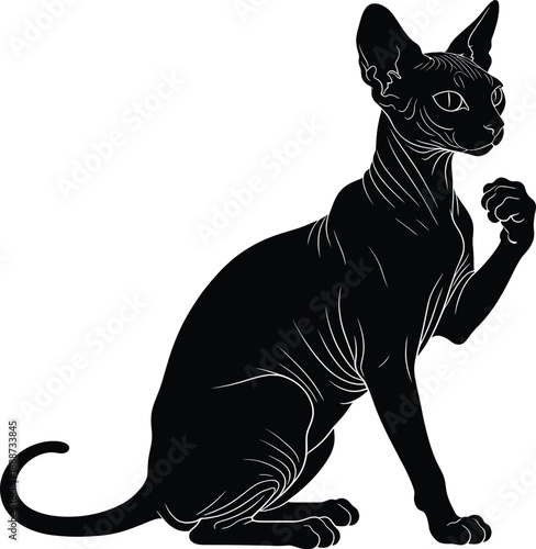Sleek black cat sitting curiously with raised paw